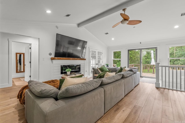 14320 Bradley Rd, Maumelle, AR 72113 - living room with light wood-type flooring, a glass covered fireplace, a ceiling fan, crown molding, and recessed lighting