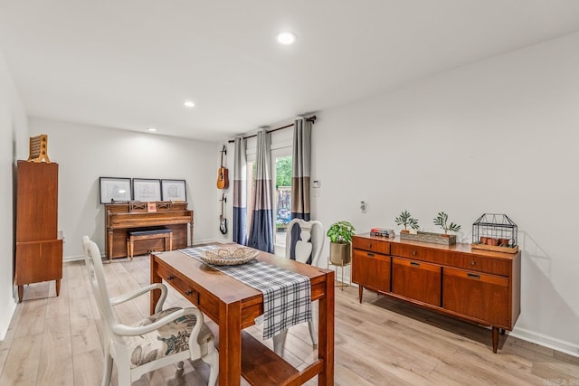 14320 Bradley Rd, Maumelle, AR 72113 - dining area with light wood-style flooring, recessed lighting, and baseboards