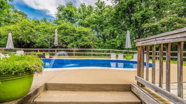 14320 Bradley Rd, Maumelle, AR 72113 - view of pool featuring a patio and view of wooded area