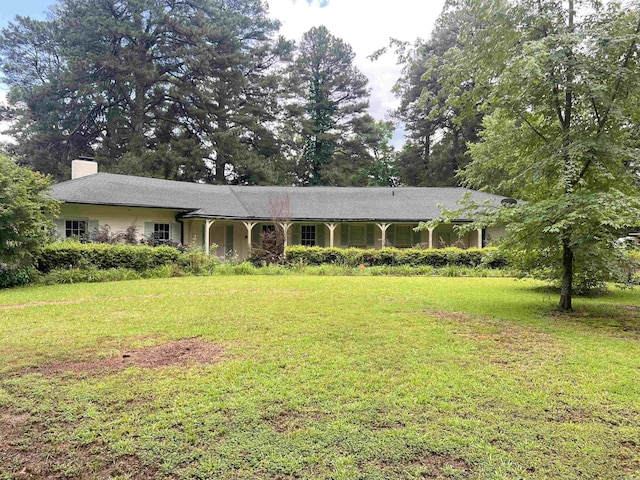 816 W 36th Ave, Pine Bluff, AR 71603 - ranch-style home with a chimney and a front lawn