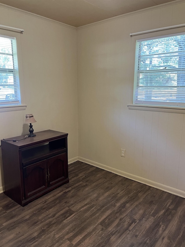 404 Rogers, Jonesboro, AR 72401 - unfurnished room with dark wood-style floors, crown molding, and baseboards