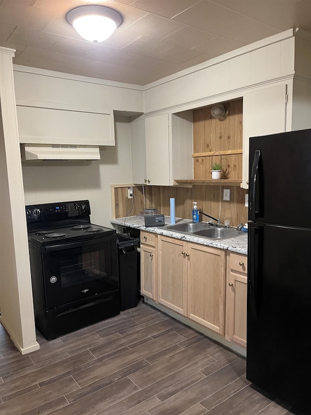 404 Rogers, Jonesboro, AR 72401 - kitchen featuring black appliances, under cabinet range hood, a sink, dark wood-type flooring, and light brown cabinets