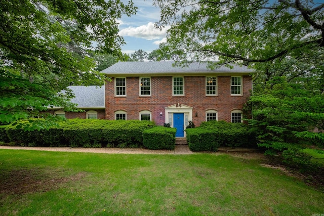 11 Bradbury Dr, Little Rock, AR 72212 - colonial-style house featuring brick siding and a front lawn