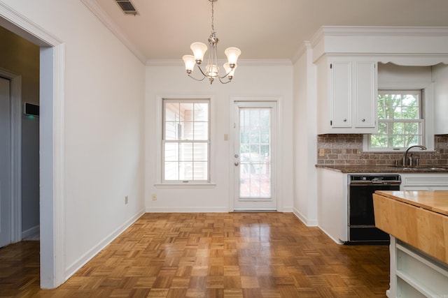 11 Bradbury Dr, Little Rock, AR 72212 - kitchen with black dishwasher, a chandelier, white cabinets, a sink, and backsplash