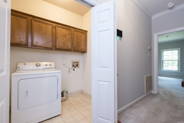 11 Bradbury Dr, Little Rock, AR 72212 - washroom with washer / clothes dryer, cabinet space, crown molding, and baseboards