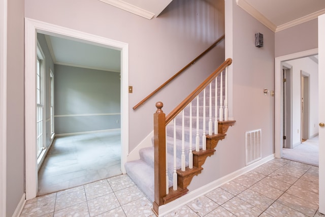11 Bradbury Dr, Little Rock, AR 72212 - staircase with carpet flooring, ornamental molding, tile patterned floors, and baseboards