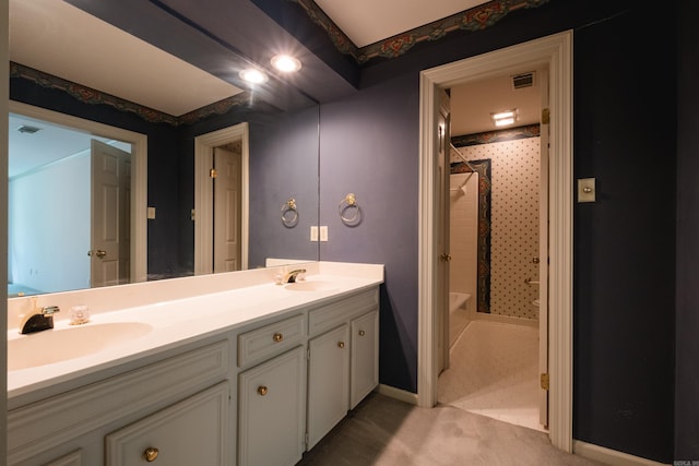 11 Bradbury Dr, Little Rock, AR 72212 - full bath featuring double vanity, bathing tub / shower combination, and baseboards