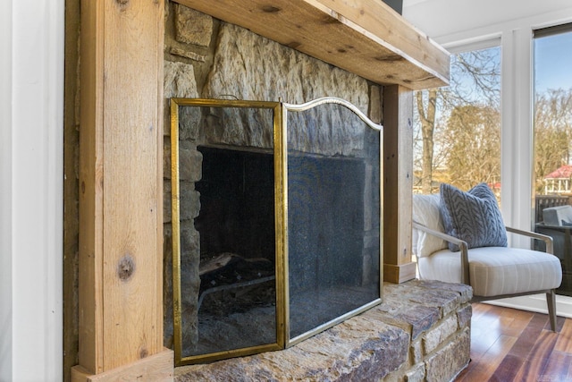 5000 Central Ave Unit 31, Hot Springs, AR 71913 - detailed view of wood finished floors and a fireplace with raised hearth
