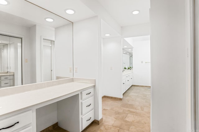 5000 Central Ave Unit 31, Hot Springs, AR 71913 - full bath featuring vanity, baseboards, stone finish floors, and recessed lighting