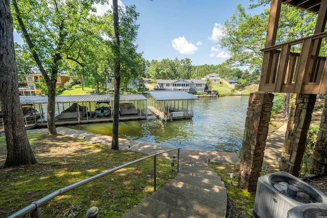 5000 Central Ave Unit 31, Hot Springs, AR 71913 - dock area with central AC, a water view, boat lift, and a residential view