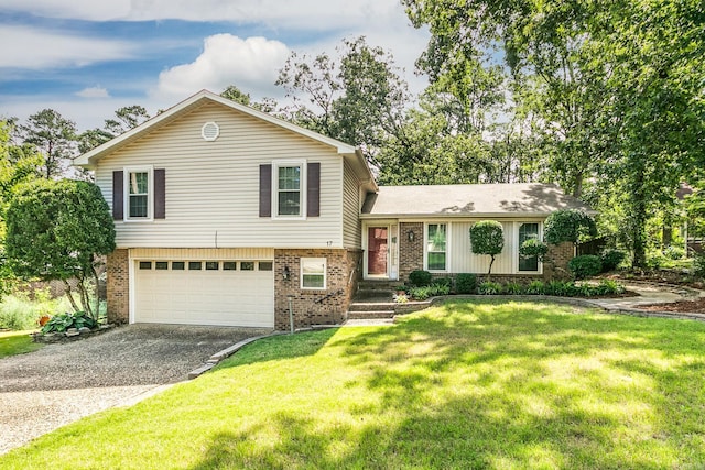 17 Point S Ct, Little Rock, AR 72211 - tri-level home with brick siding, driveway, an attached garage, and a front lawn