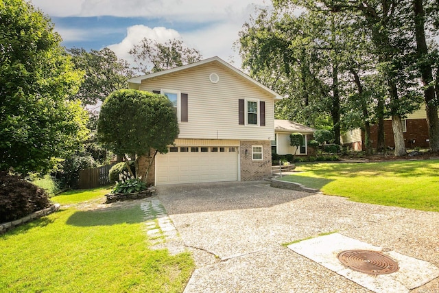 17 Point S Ct, Little Rock, AR 72211 - view of front of property with concrete driveway, brick siding, an attached garage, and a front lawn