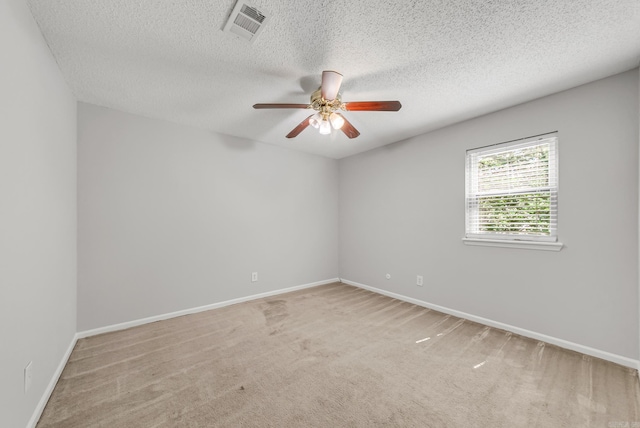 17 Point S Ct, Little Rock, AR 72211 - carpeted spare room featuring a textured ceiling, a ceiling fan, and baseboards