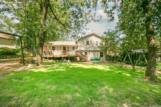 17 Point S Ct, Little Rock, AR 72211 - view of grassy yard featuring a deck, stairway, and a playground