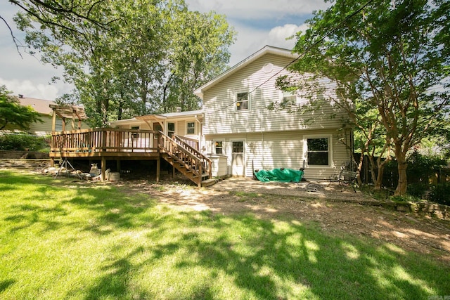 17 Point S Ct, Little Rock, AR 72211 - rear view of property with a deck, stairs, and a lawn