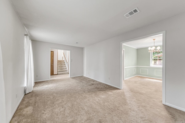 17 Point S Ct, Little Rock, AR 72211 - unfurnished room featuring carpet floors, a chandelier, and stairs