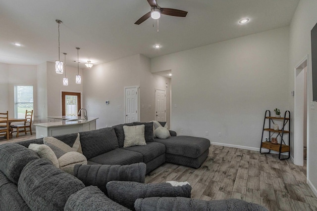 205 Capitol Cv, Jonesboro, AR 72401 - living area with light wood finished floors, a ceiling fan, and recessed lighting