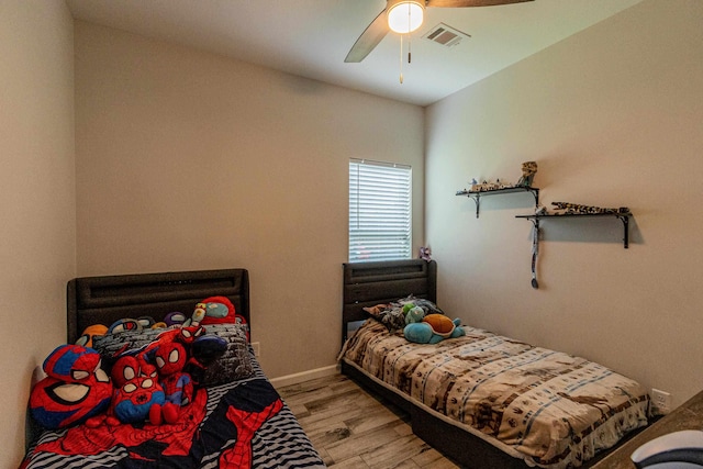 205 Capitol Cv, Jonesboro, AR 72401 - bedroom with light wood-style floors and ceiling fan