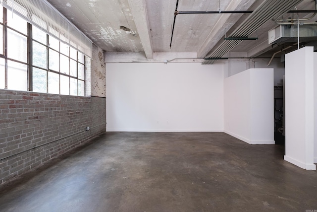 423 E 3rd St Unit 211, Little Rock, AR 72201 - basement with brick wall and baseboards