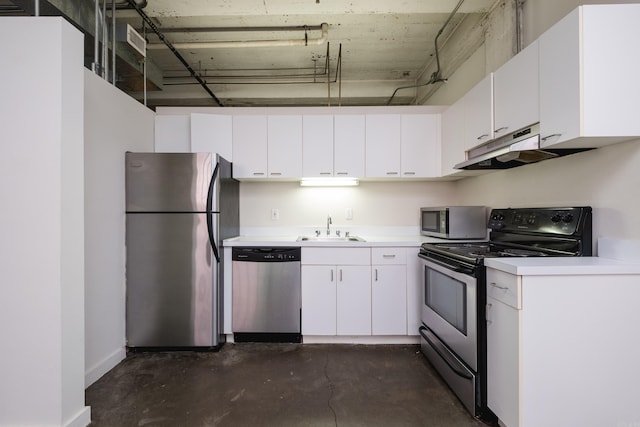 423 E 3rd St Unit 211, Little Rock, AR 72201 - kitchen featuring appliances with stainless steel finishes, a sink, concrete flooring, light countertops, and under cabinet range hood