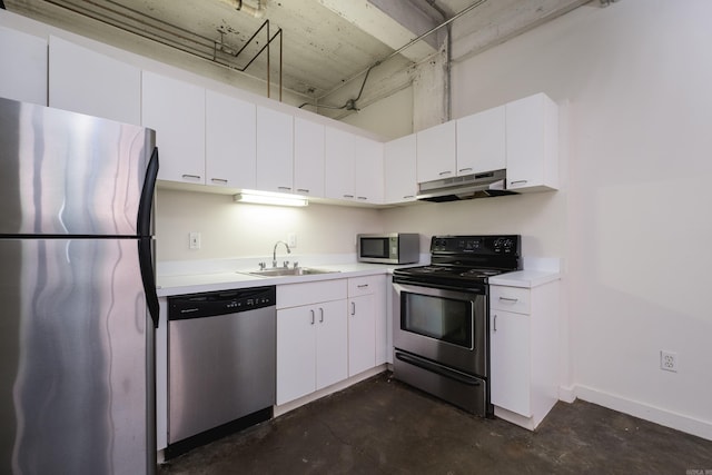 423 E 3rd St Unit 211, Little Rock, AR 72201 - kitchen with appliances with stainless steel finishes, under cabinet range hood, a sink, concrete floors, and light countertops