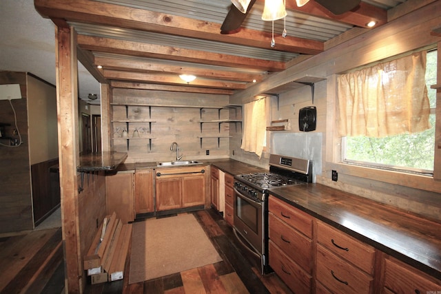 803 Reeder Rd, Leola, AR 72084 - kitchen with gas range, a sink, dark wood finished floors, open shelves, and beam ceiling