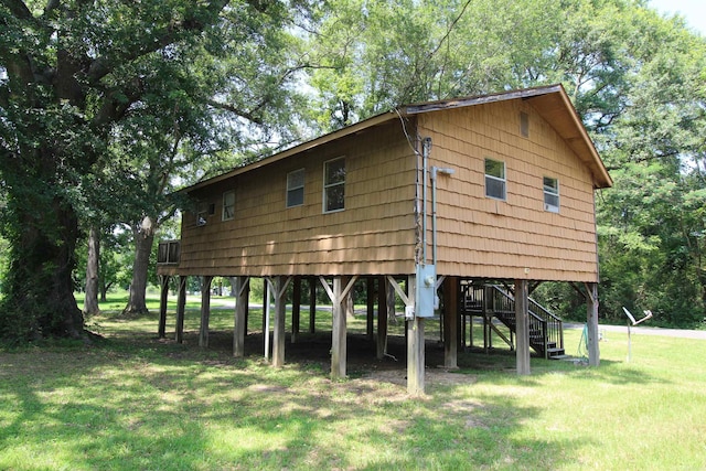 803 Reeder Rd, Leola, AR 72084 - surrounding community featuring a lawn, stairs, and a carport