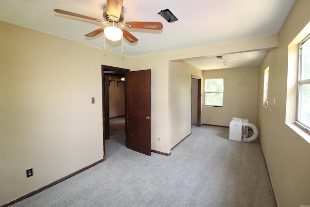 803 Reeder Rd, Leola, AR 72084 - unfurnished room with light carpet, a ceiling fan, and baseboards