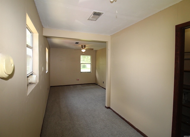 803 Reeder Rd, Leola, AR 72084 - unfurnished room with carpet, a ceiling fan, and baseboards