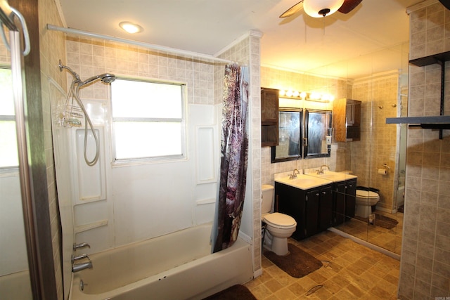 803 Reeder Rd, Leola, AR 72084 - bathroom featuring toilet, tile walls, shower / bath combination with curtain, a ceiling fan, and vanity