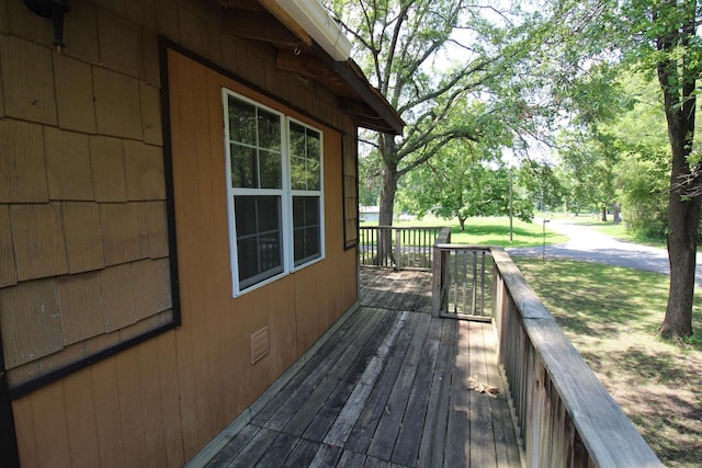 803 Reeder Rd, Leola, AR 72084 - wooden deck featuring a lawn