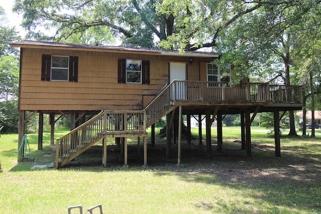 803 Reeder Rd, Leola, AR 72084 - view of front of house featuring a front lawn, a wooden deck, stairs, and a carport