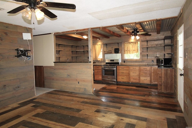 803 Reeder Rd, Leola, AR 72084 - kitchen with stainless steel appliances, a ceiling fan, wood walls, open shelves, and dark wood-style flooring