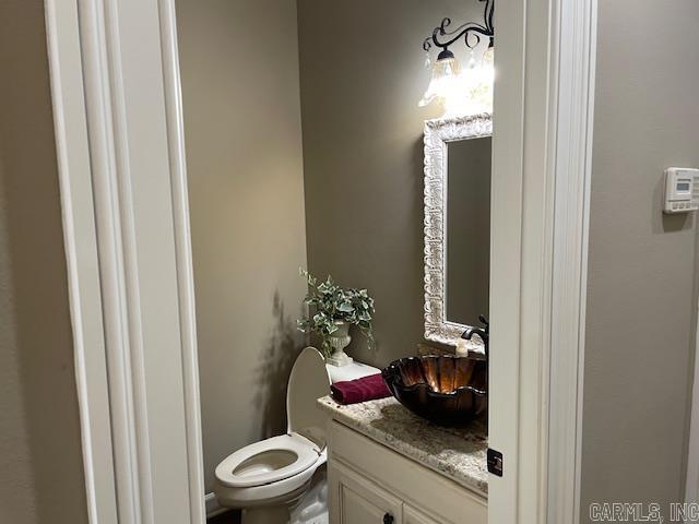 3165 Majestic Cir, Conway, AR 72034 - bathroom featuring vanity and toilet