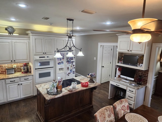 3165 Majestic Cir, Conway, AR 72034 - kitchen with white appliances, white cabinets, decorative backsplash, crown molding, and decorative light fixtures