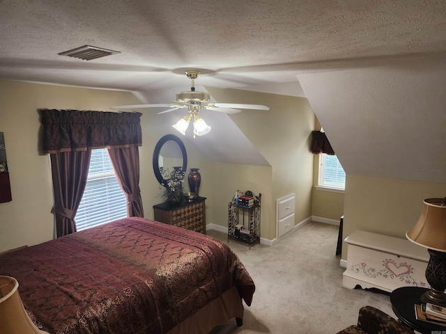 3165 Majestic Cir, Conway, AR 72034 - bedroom with carpet, lofted ceiling, a textured ceiling, and ceiling fan