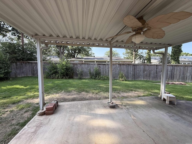 913 Schriner Ct, North Little Rock, AR 72116 - fenced backyard featuring a patio and ceiling fan