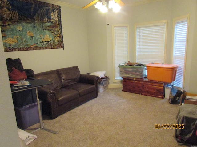 145 Eagles Nest Cv, Austin, AR 72007 - living area featuring ornamental molding, a ceiling fan, and carpet
