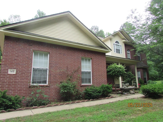 145 Eagles Nest Cv, Austin, AR 72007 - view of front facade featuring brick siding