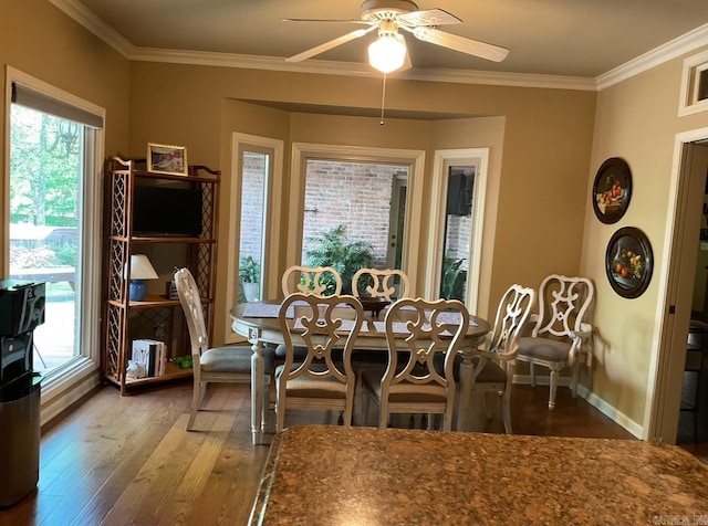 304 Quail Creek Rd, Hot Springs National Park, AR 71901 - dining space with ceiling fan, wood-type flooring, crown molding, and baseboards