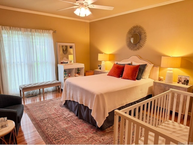 304 Quail Creek Rd, Hot Springs National Park, AR 71901 - bedroom with wood finished floors, ornamental molding, and a ceiling fan