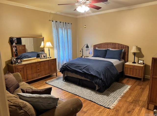 304 Quail Creek Rd, Hot Springs National Park, AR 71901 - bedroom featuring wood finished floors, ornamental molding, and ceiling fan