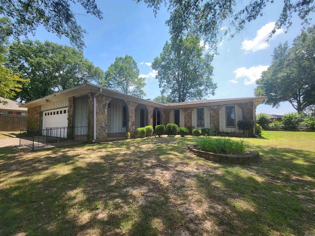 1008 W A Ave, North Little Rock, AR 72116 - ranch-style house featuring stone siding and a garage