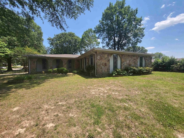 1008 W A Ave, North Little Rock, AR 72116 - view of front of property with a front lawn and stone siding