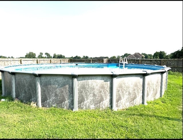 6484 N US Highway 61, Blytheville, AR 72315 - view of swimming pool with a fenced backyard