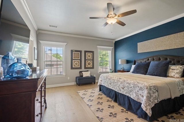 106 Hidden Falls Ln, Maumelle, AR 72113 - bedroom with light wood finished floors, crown molding, and a ceiling fan