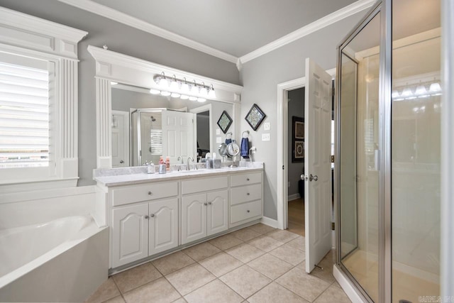 106 Hidden Falls Ln, Maumelle, AR 72113 - bathroom with vanity, a stall shower, tile patterned floors, a garden tub, and crown molding