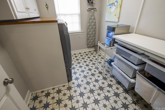106 Hidden Falls Ln, Maumelle, AR 72113 - kitchen featuring light flooring and white cabinets