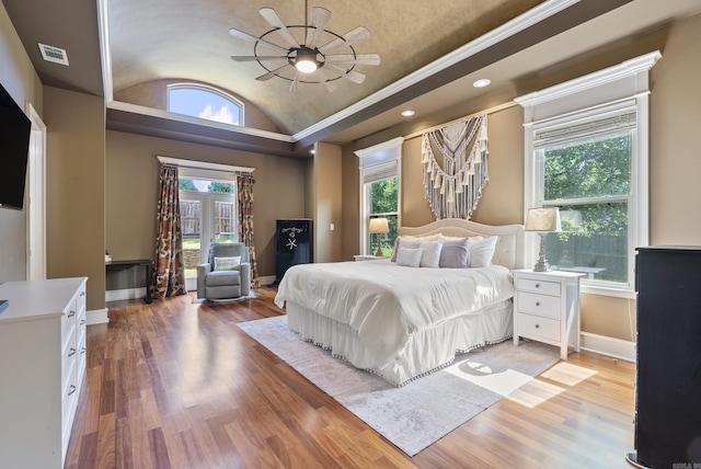 5526 Palisades Cv, Benton, AR 72019 - bedroom featuring vaulted ceiling, wood finished floors, multiple windows, recessed lighting, and ornamental molding