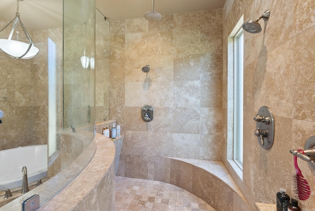 5526 Palisades Cv, Benton, AR 72019 - bathroom featuring a tile shower and a bath